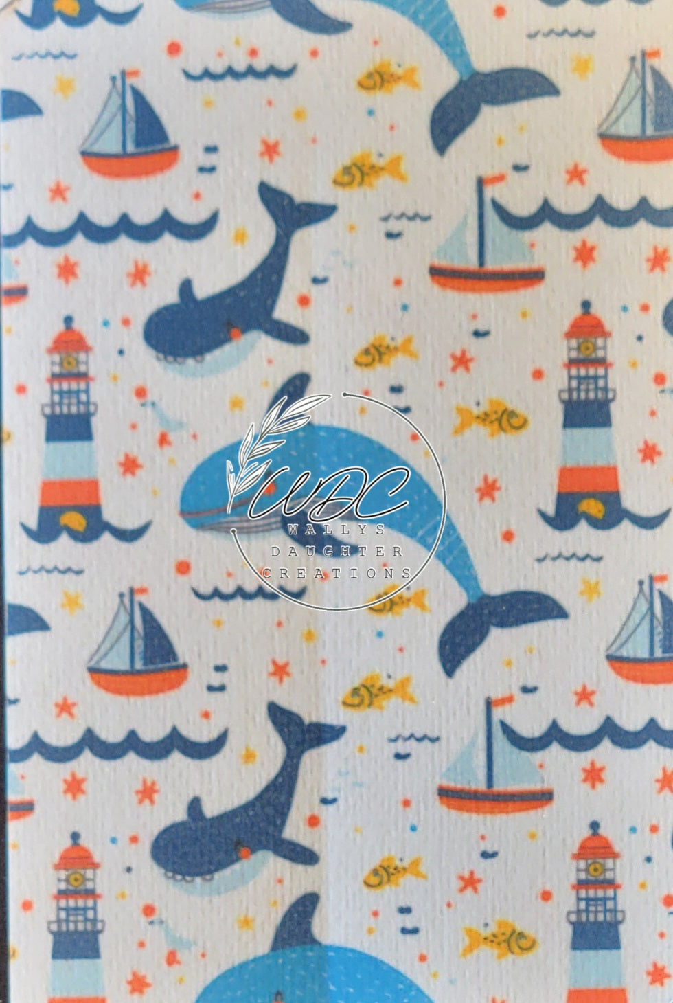 Sublimated Hypafix tape with whales and lighthouses and sailboats on white background