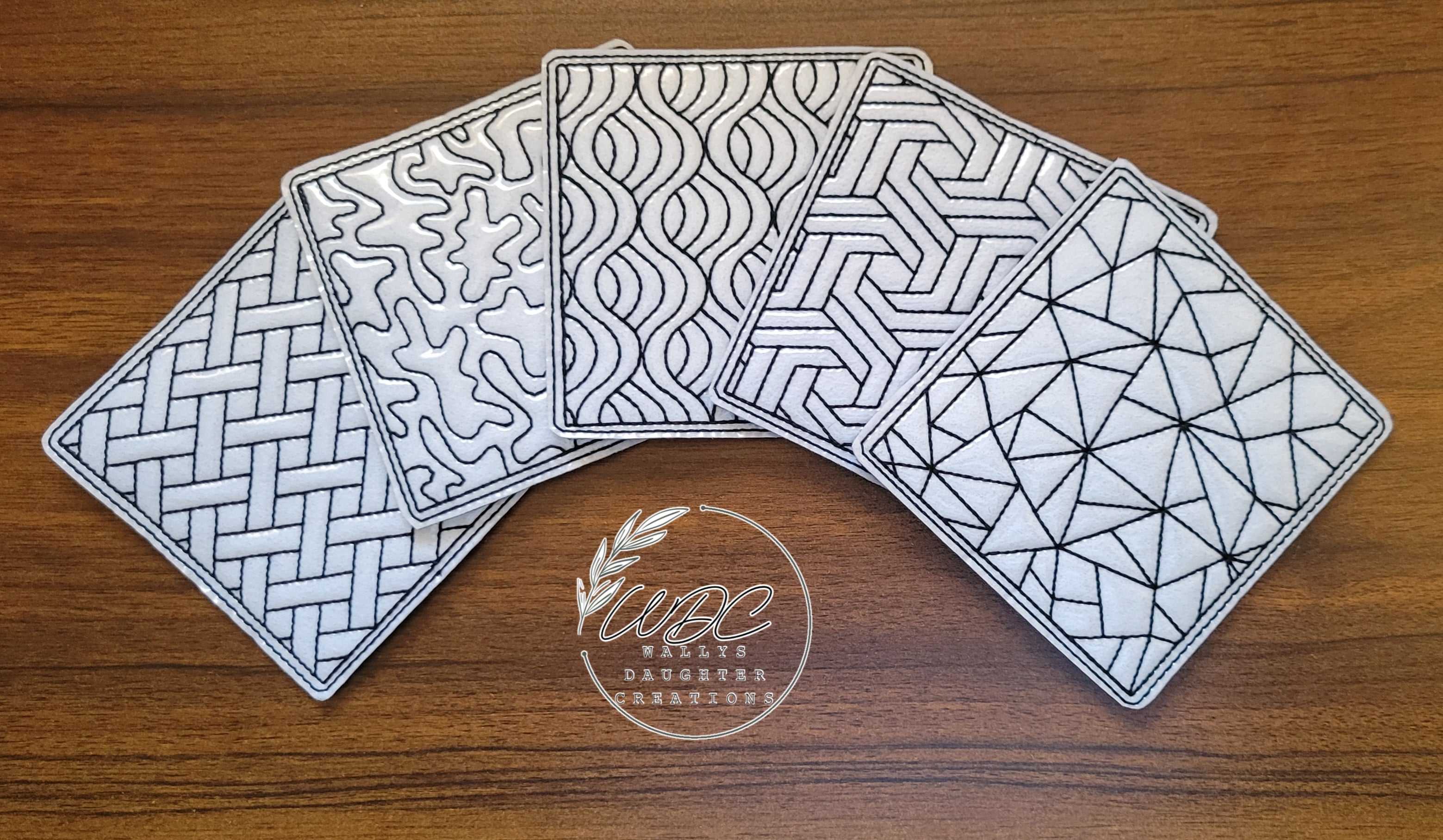 Set of 5 square wipeable coloring page blocks with different geometric designs