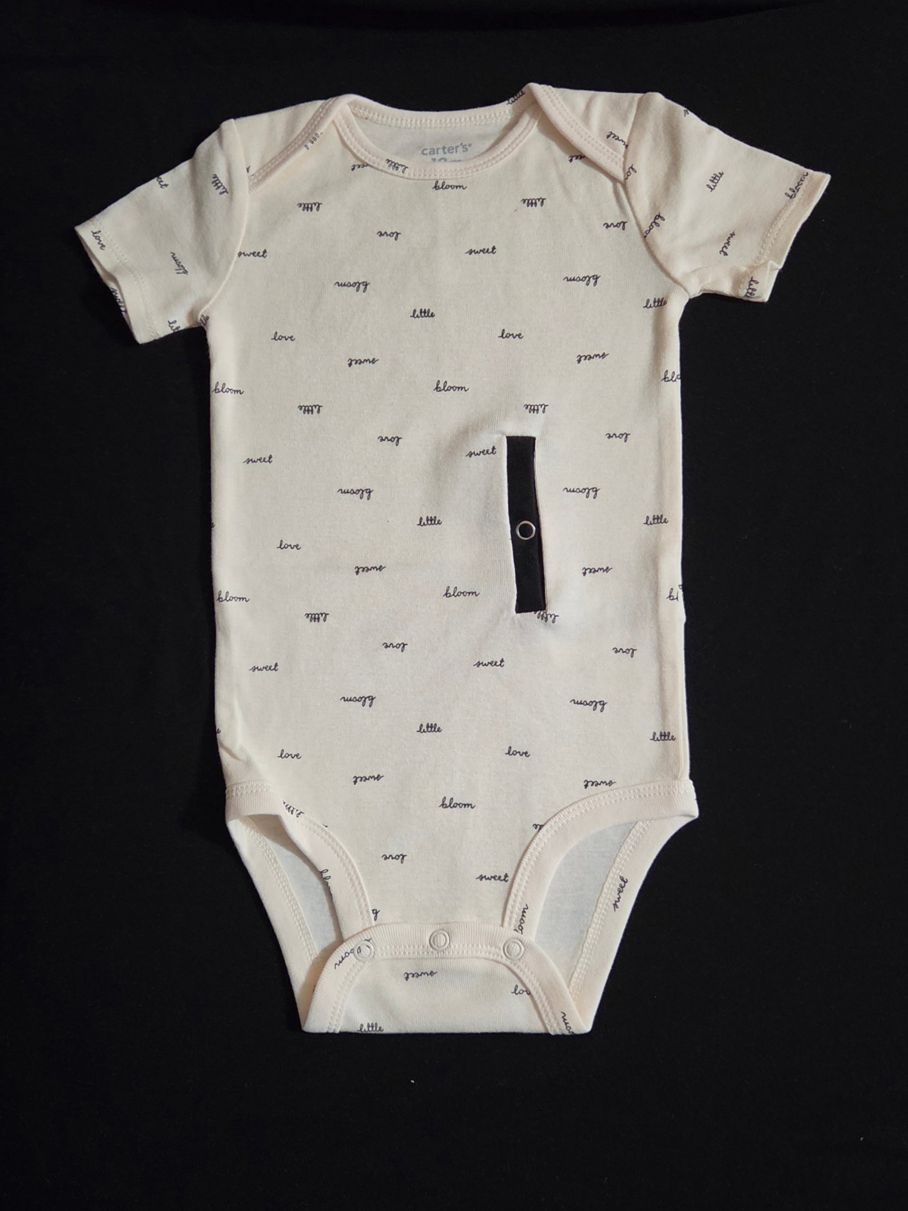 gtube adapted bodysuit on cream with words bloom, sweet, little, and love