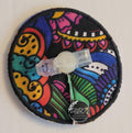 Colorful gtube pad with intricate patterns on a white background