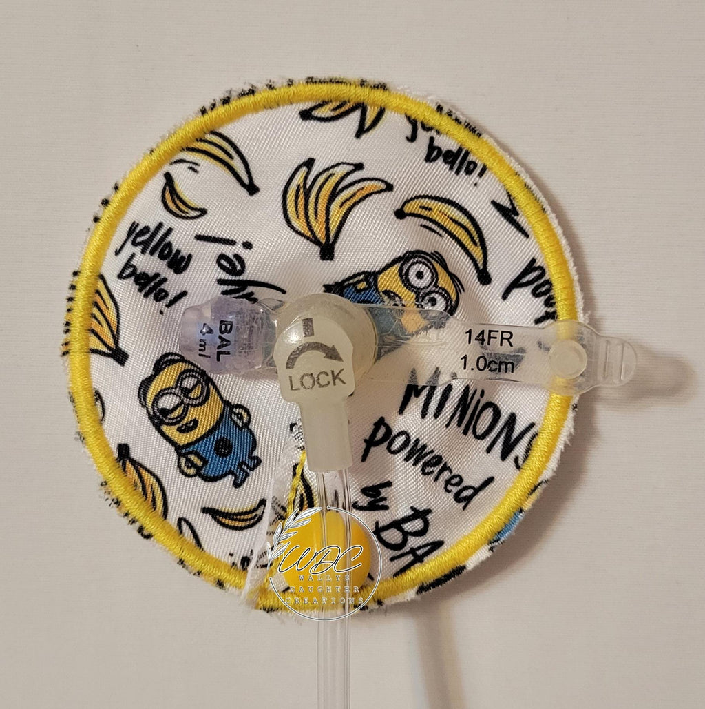 yellow thread around gtube pad with characters and bananas