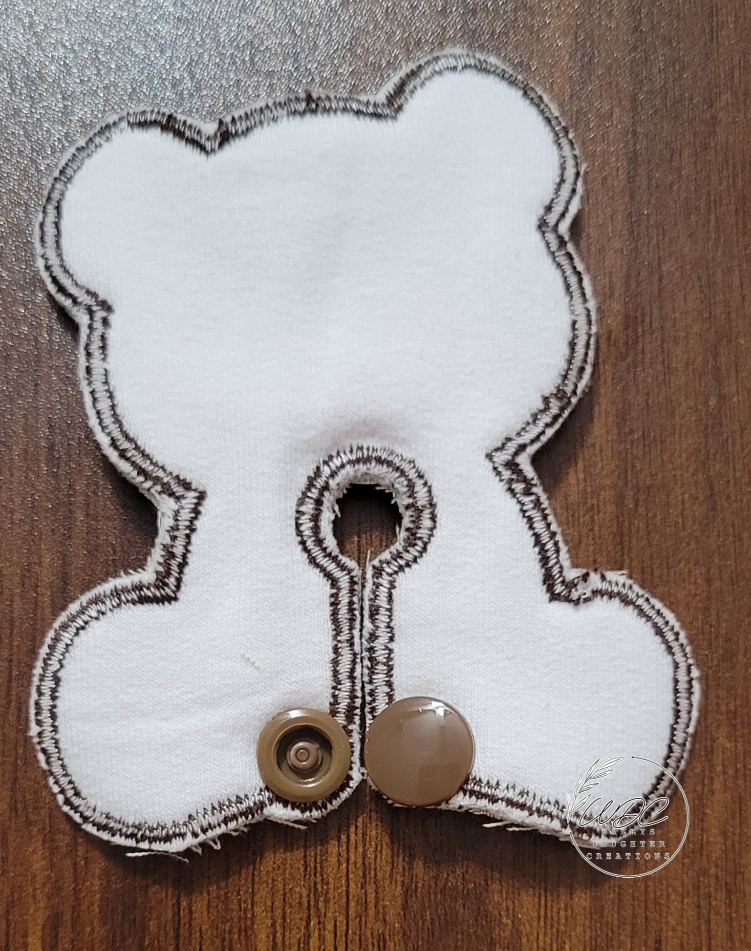 Back side view of teddy gtube pad