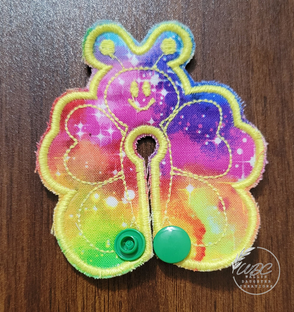 Galaxy print fabric on a butterfly shaped gtube pad.