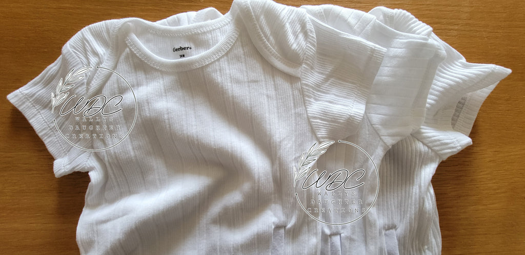 close up of white bodysuit adapted for gtube access in ribbed texture