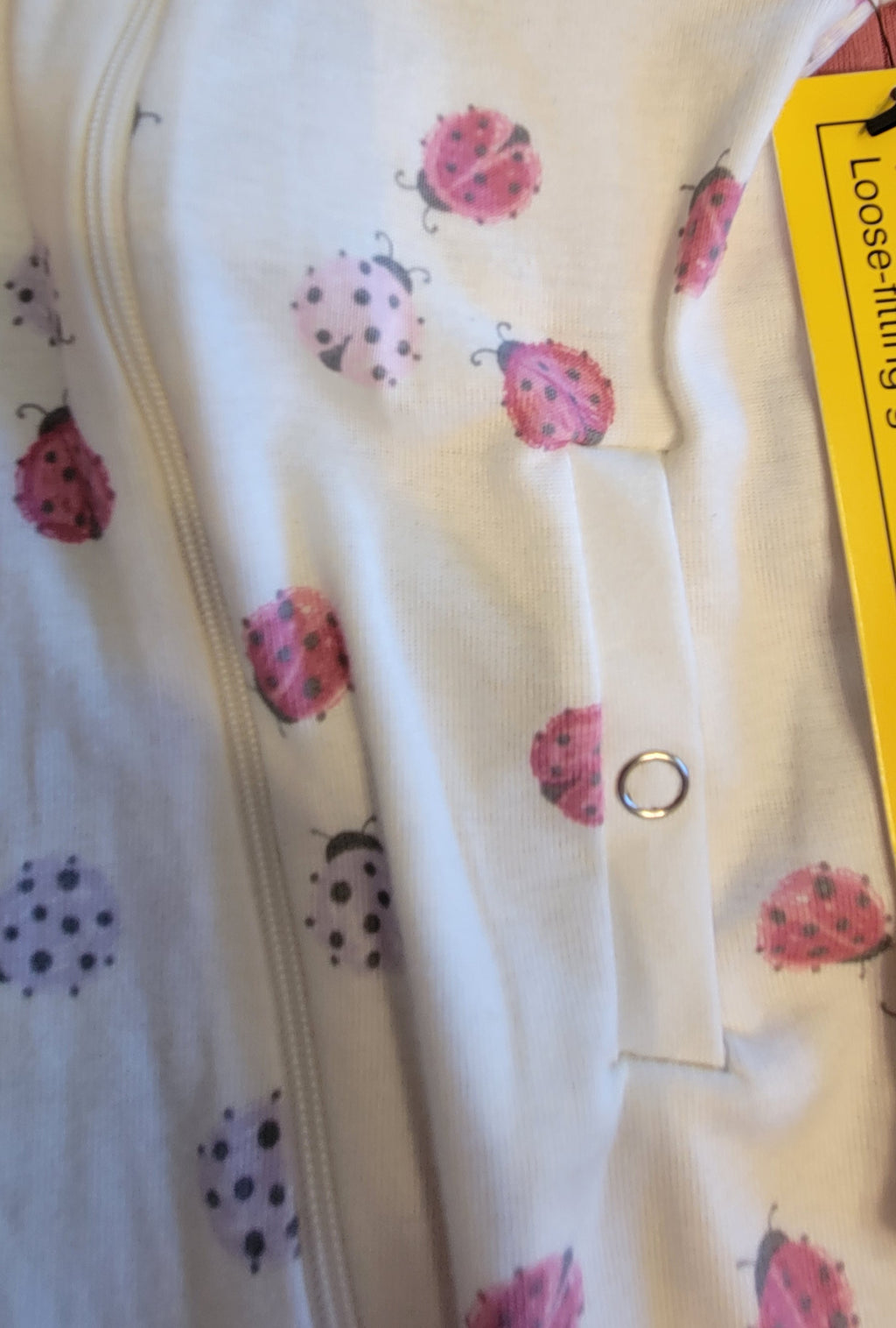 close up of gtube access opening on ladybug clothing