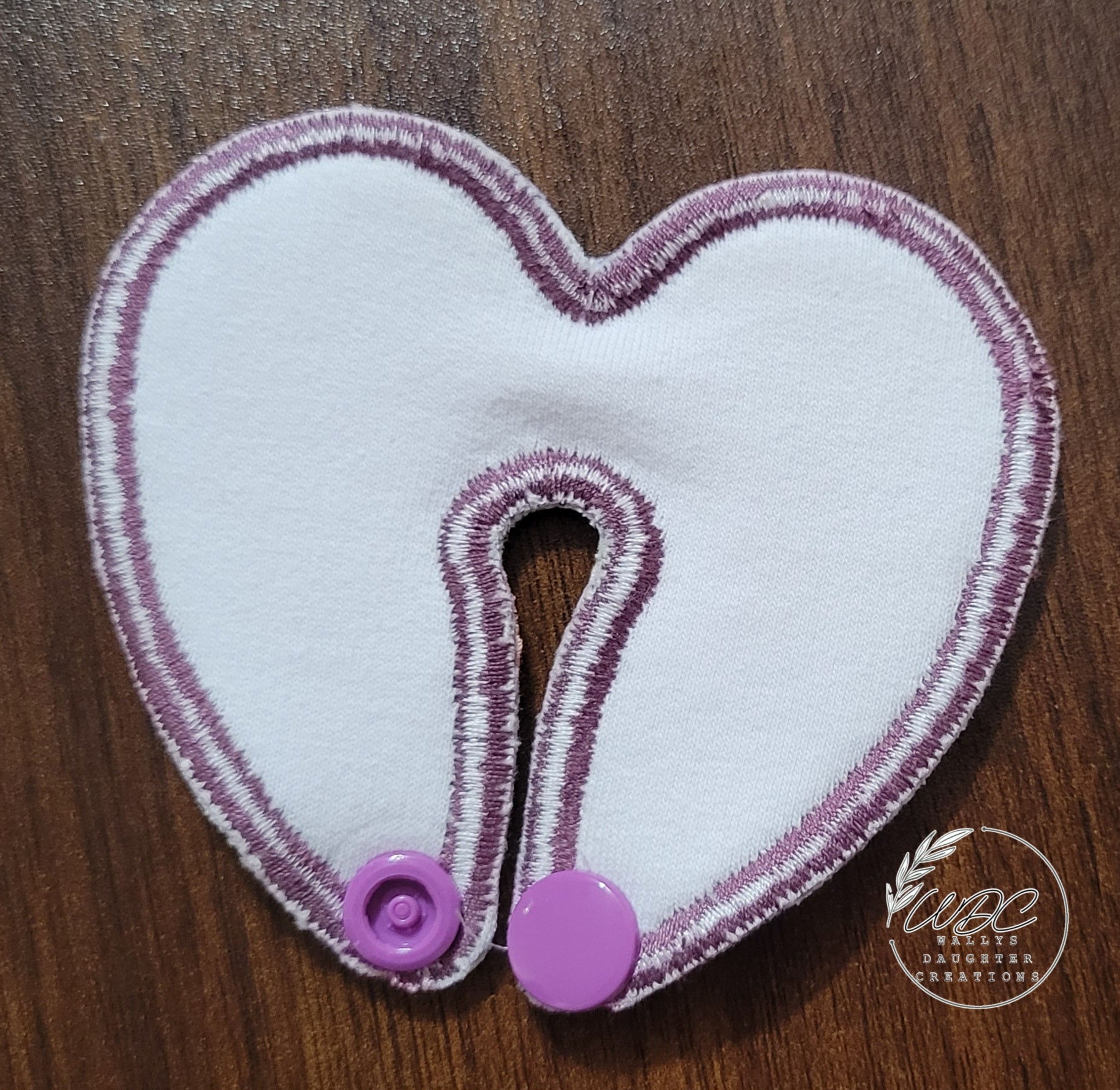 backside of heart shaped gtube pad