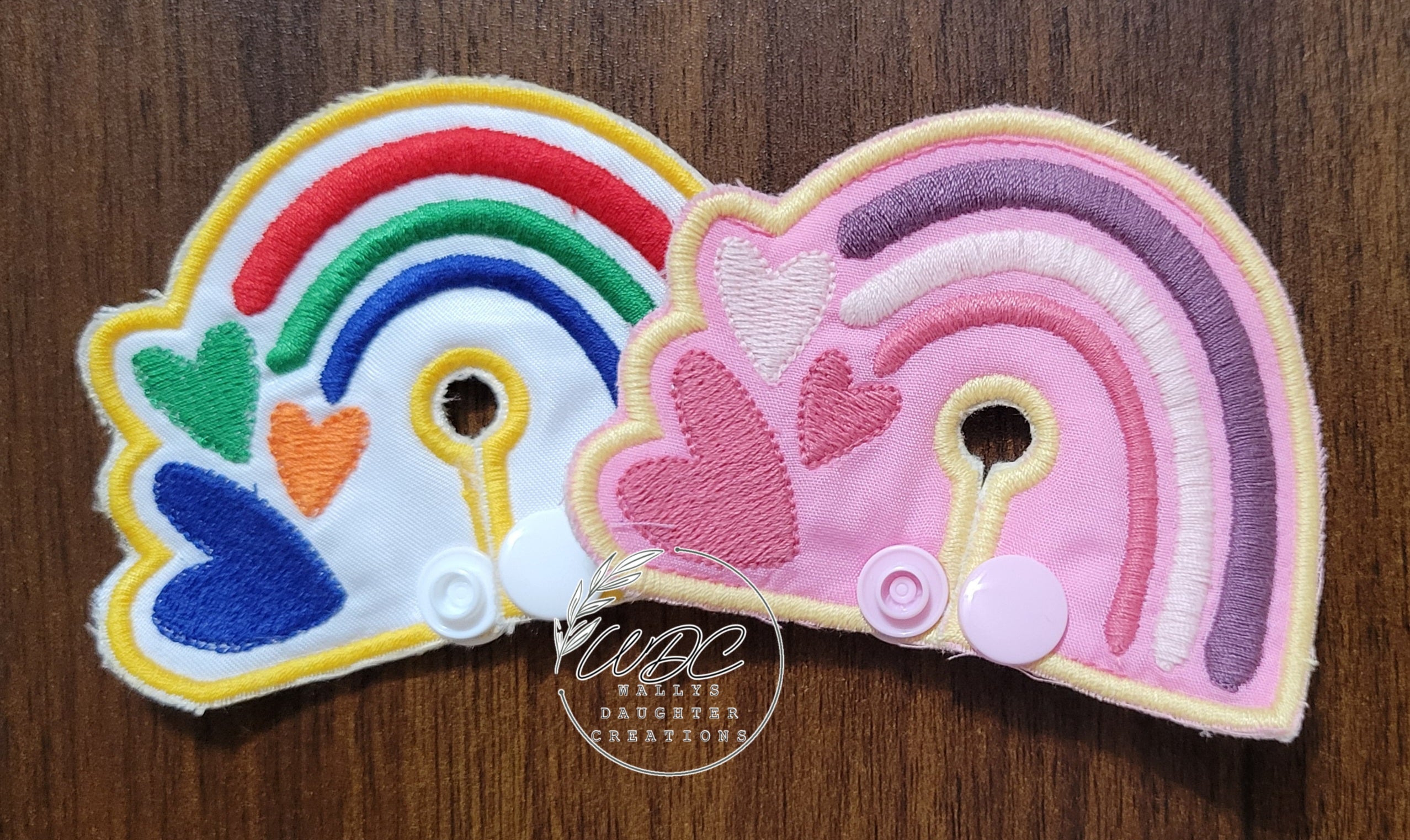 Rainbow shaped gtube pads with hearts in 2 color ways