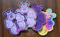 Butterfly shaped gtube pads in various colors