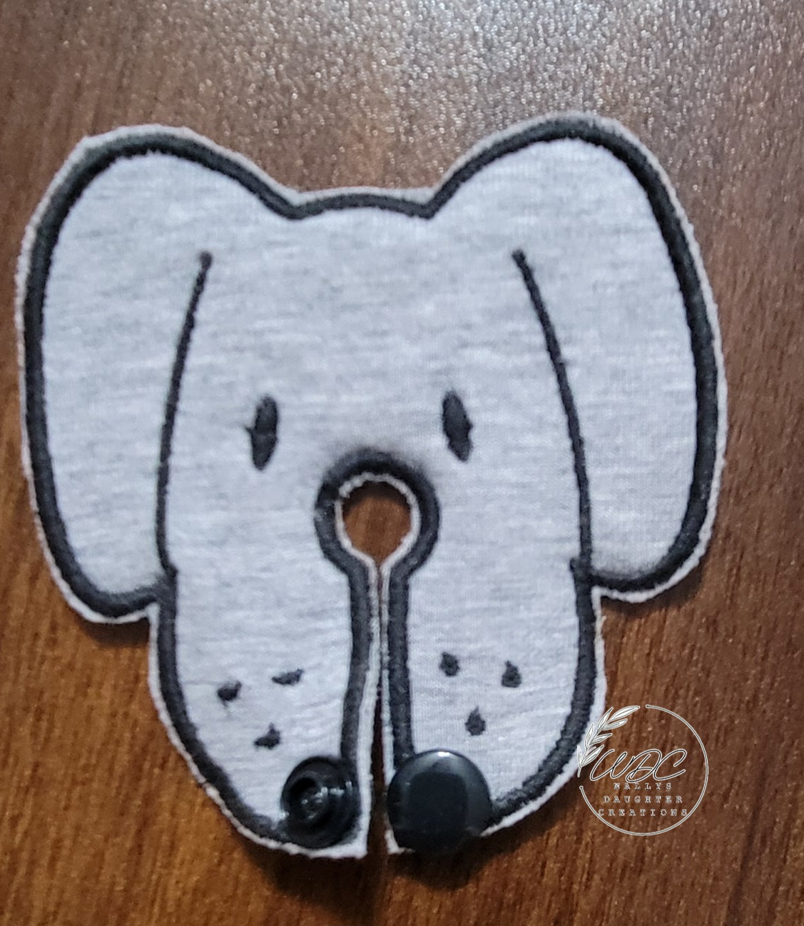Grey dog face shape gtube pad