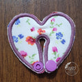 heart shaped gtube pad with floral fabric and purple thread size small