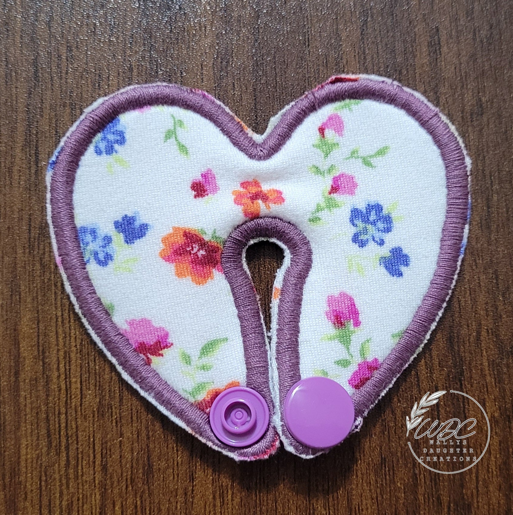 heart shaped gtube pad with floral fabric and purple thread size small