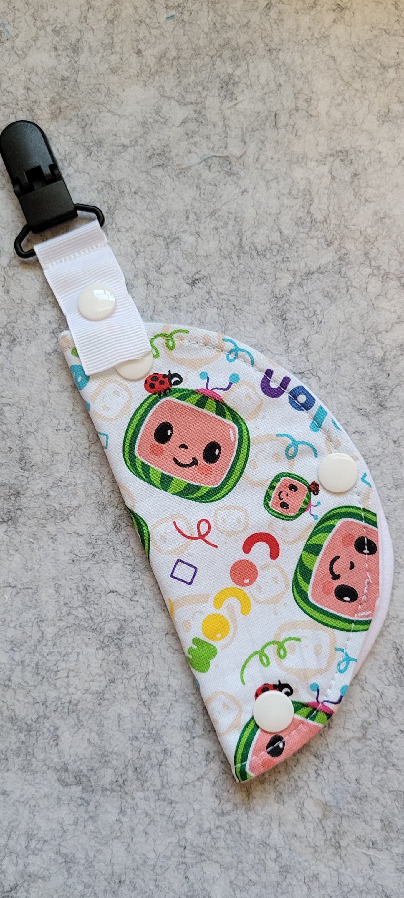 Clip on Port cover with character print