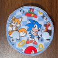 Blue Hedgehog character in a snap down pad