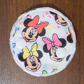Snap down pad with mouse character and colorful bows